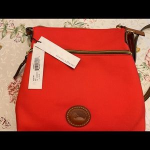 Brand New Dooney and Bourke nylon crossbody purse.